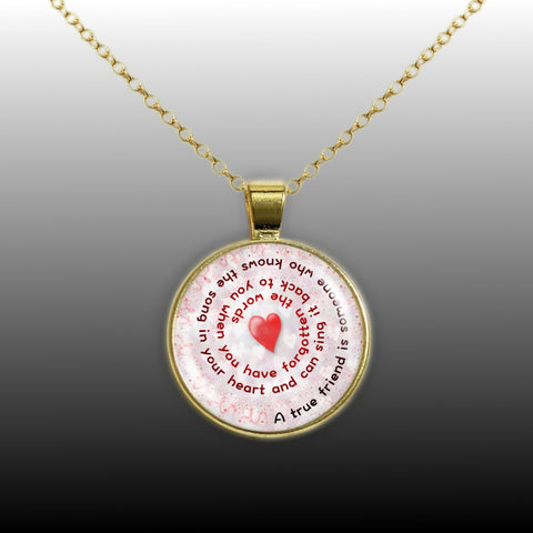 A True Friend Is Someone Who Knows the Song in Your Heart ... Heart Swirl 1" Pendant Necklace in Gold Tone