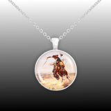 A Bad Hoss Cowboy & Horse Russell Western Art Painting 1" Pendant Necklace in Silver Tone