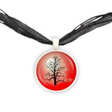 Bare Maple Tree w/o Leaves Silhouette Against Moon w/ Red Background Pendant Necklace in Silver Tone