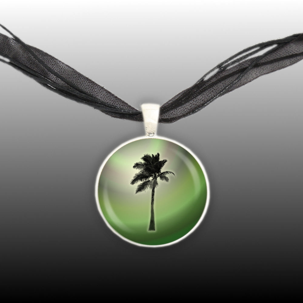 Tropical Palm Tree Silhouette w/ Green & Brown Swirl Background Pendant Necklace in Silver Tone