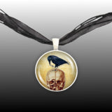 Black Raven or Crow Perched on Red Skull Vintage Style Artwork 1" Pendant Chain Necklace in Silver Tone or Gold Tone
