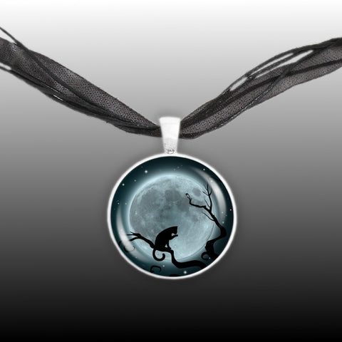 Cat Licking Paw in Tree Against Blue Tinted Moon Autumn & Halloween Illustration Art 1" Pendant Necklace in Silver Tone
