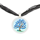 Tree w/ Bluebirds Against Blue Sky Illustration Folk Art Style 1" Pendant Necklace Silver Tone